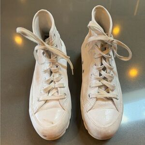 Women’s Converse high top tennis shoes, size 7.5